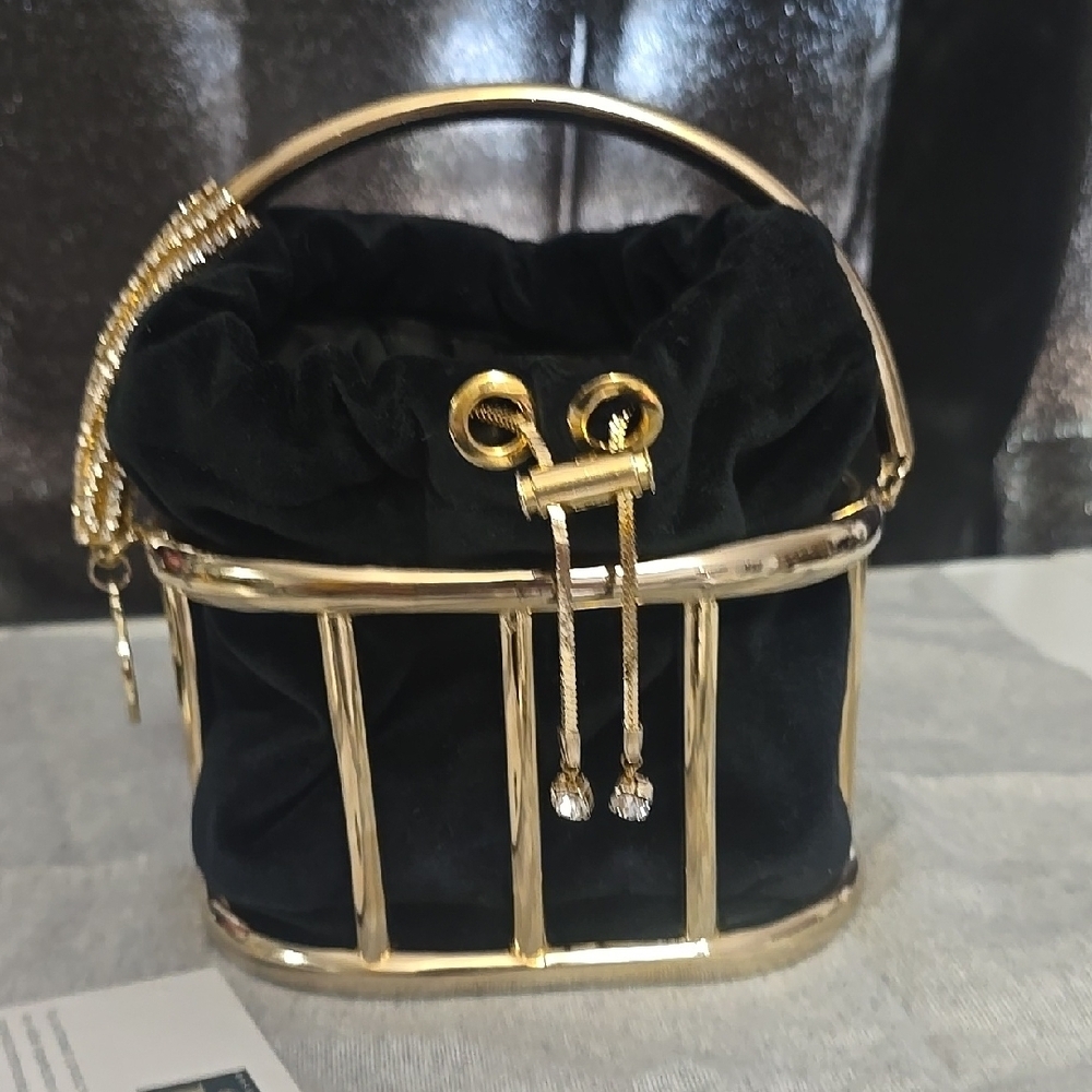 Rosantica Milano Alcatraz velvet pouch cage bag. Missing 1 stone pictured